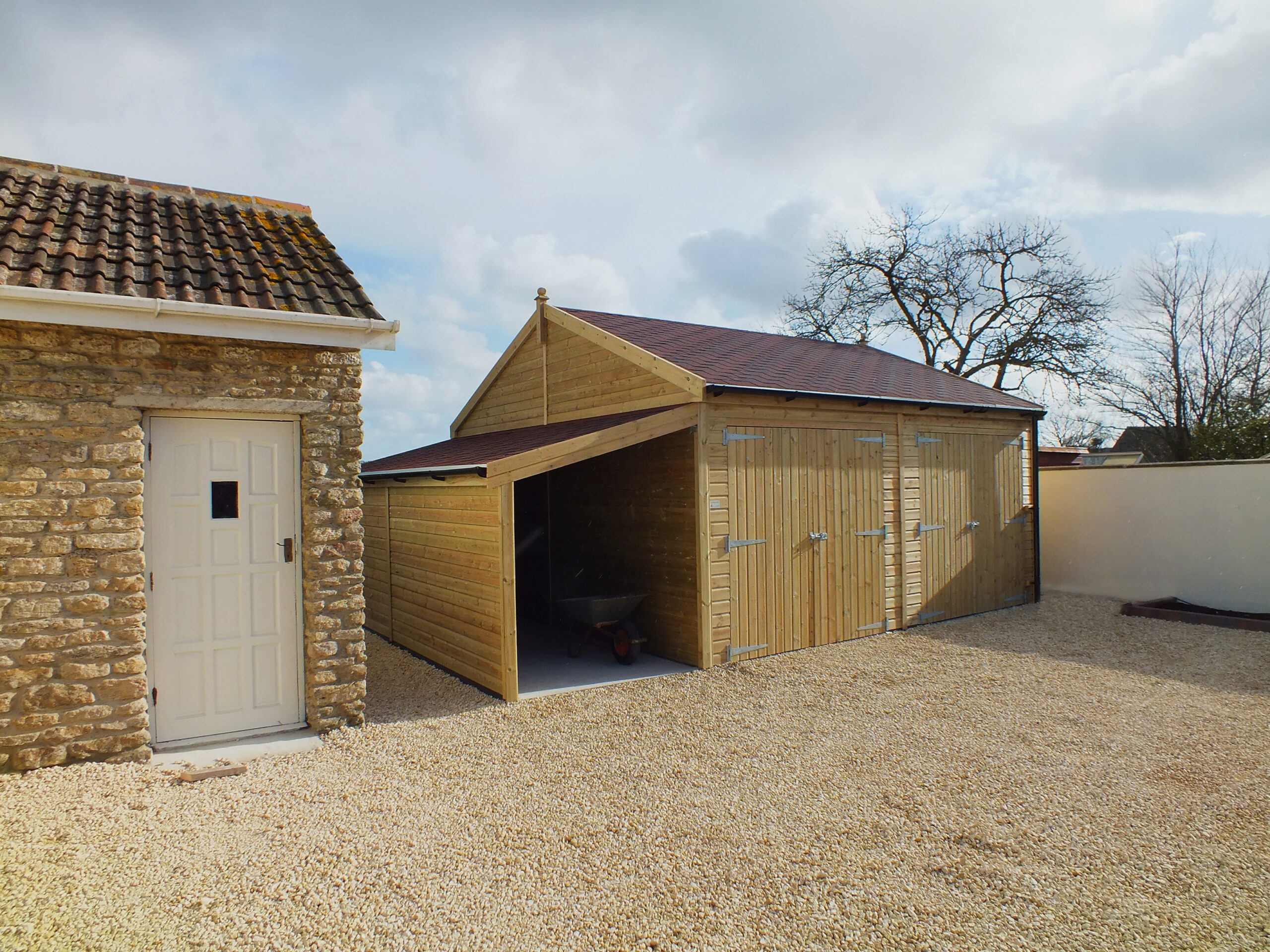 Two Bay Wooden Garage with Garden Store